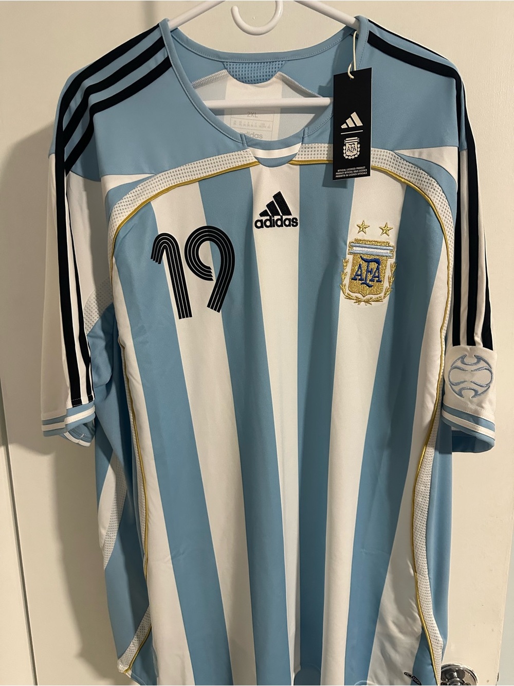 Adidas Men’s Argentina Messi #19 2006 Bringback Vintage Home Replica Jersey.